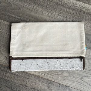 Bone White Maasai Portfolio NWOT. Smoke free home.